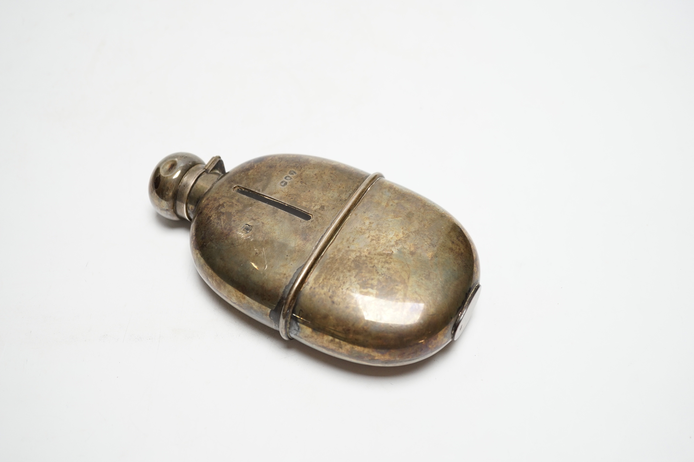 A late Victorian silver mounted glass hip flask, W & G Neal, London, 1894, 15.2cm.